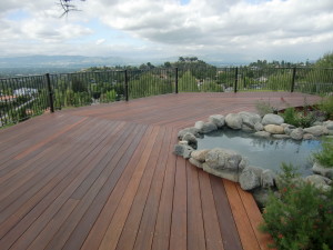mahogany deck with a pool on the top of a los angeles hill