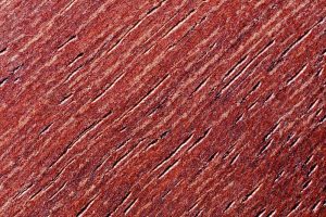 a closeup of purpleheart wood grain