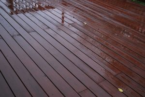 Wet pressure-treated wood deck