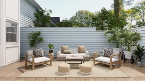 An outdoor living area couch and chair set on a patio