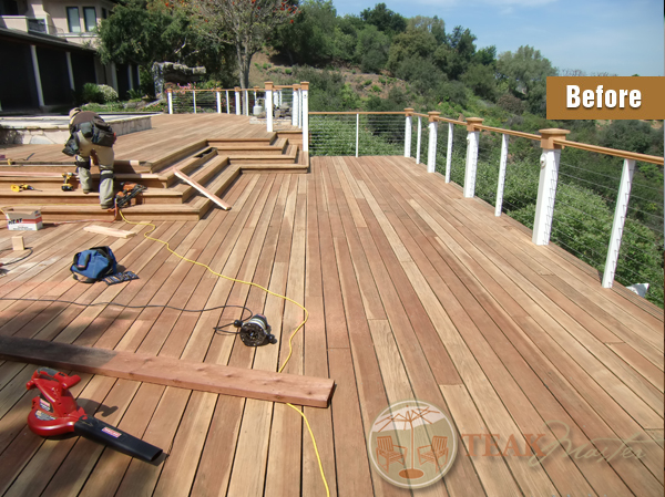 A view of a large deck before Team Masters' restoration process.