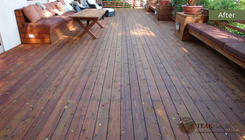An inviting and cozy redwood deck after Teak Masters' restoration with plenty of seating for family and friends.