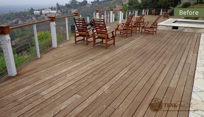 A dry, cracked and lifeless redwood deck before Teak Masters employs they incredible restoration techniques.